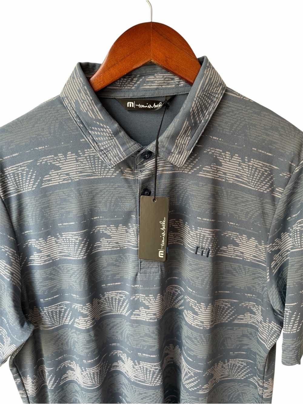 NWT Travis Matthew Golf Polo
Slate Blue tropical design

Size Large